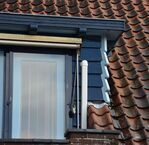 De gegolfd gezaagde balken komen ook mooi terug in het balkon.
<br/>
Richard Keijzer, 2015-01-31